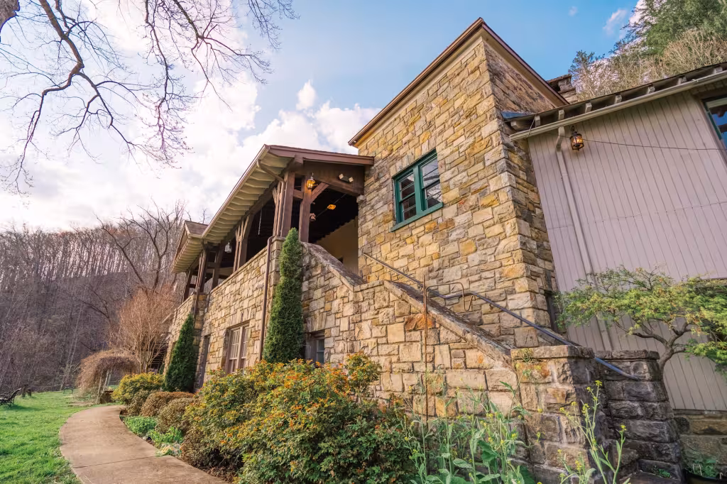 The Italian cut stone front of the lodge