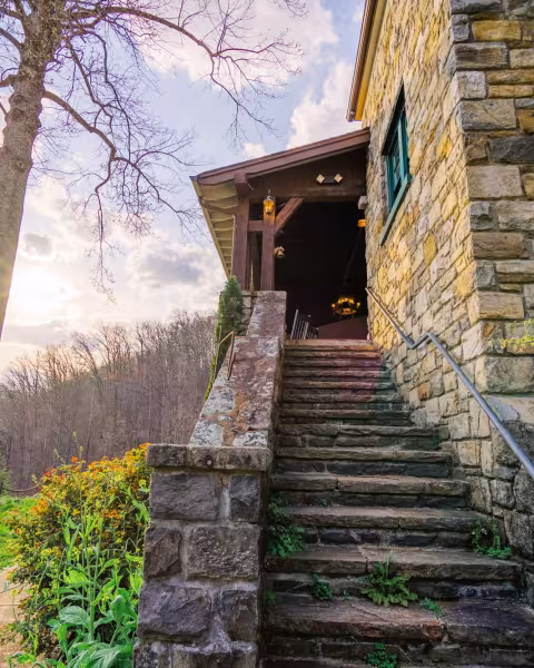 Stone staircase on the front of the lodge